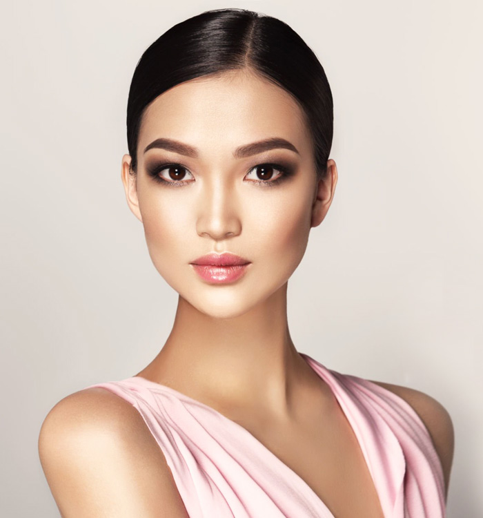 An asian woman with pink dress